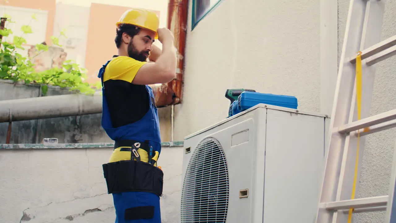 Technician performing air duct cleaning in Atlanta home