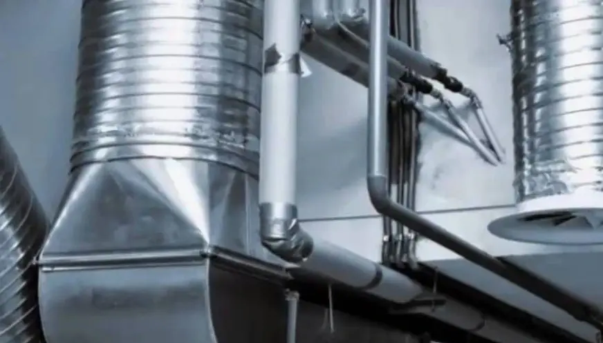 Commercial Duct Cleaning Stewarts Mill GA | Guide 1 commercial HVAC technician inspecting office duct system in Stewarts Mill Douglasville GA
